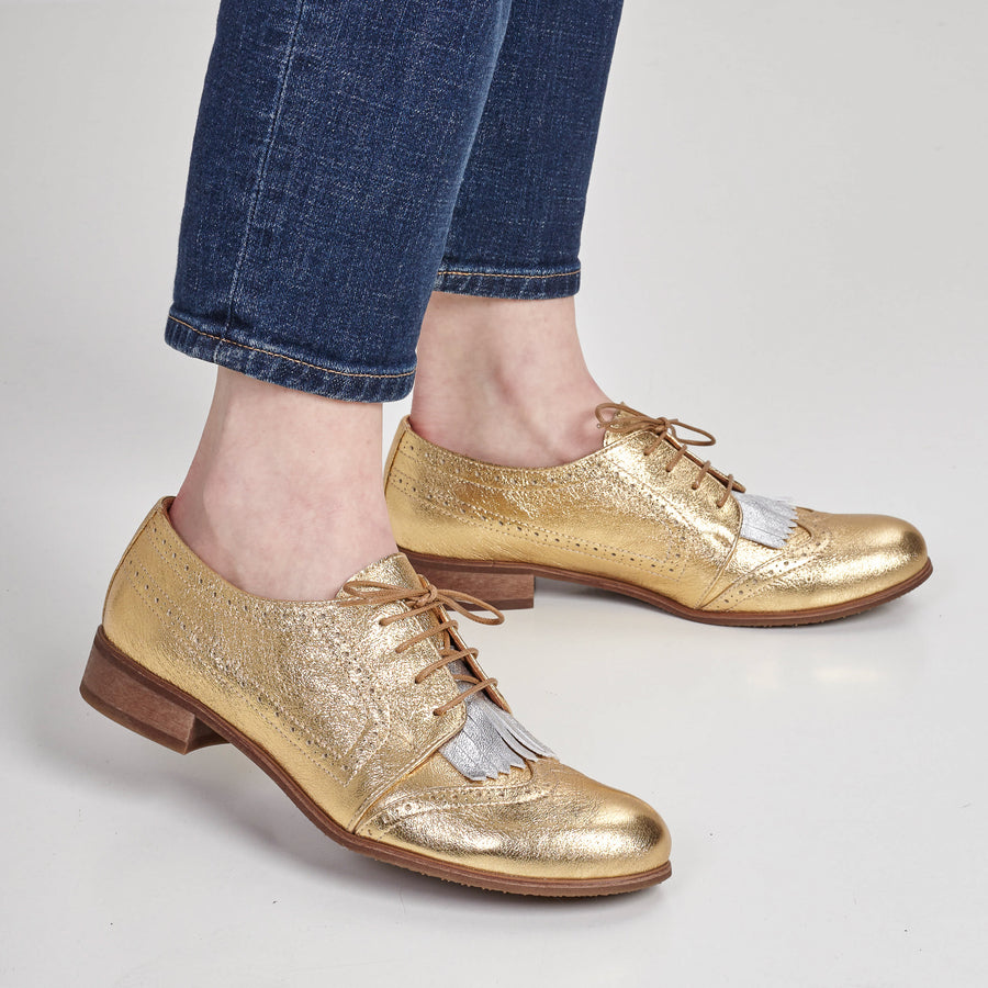 gold oxford shoes by julia bo